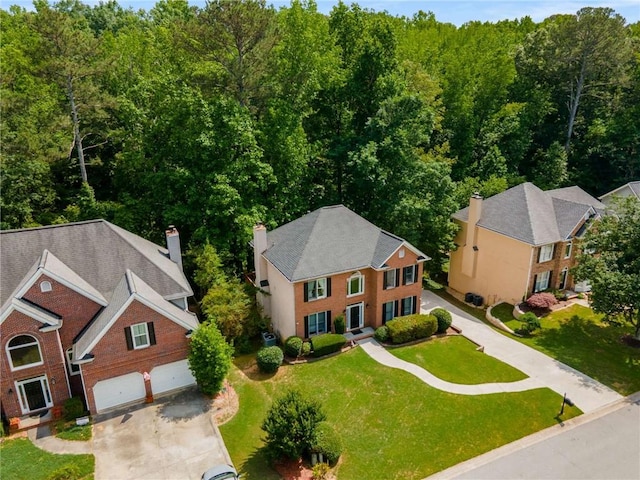 1019 Legacy Walk, Woodstock, GA 30189 - view from above of property with a forest