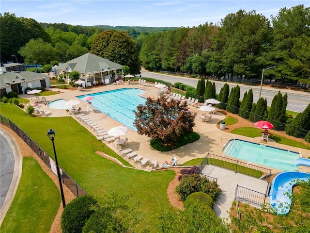 1019 Legacy Walk, Woodstock, GA 30189 - community pool with a patio area and a wooded view