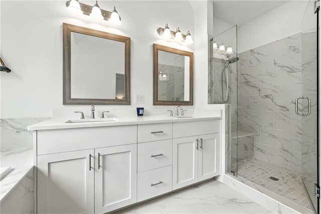 full bath featuring marble finish flooring, a shower stall, double vanity, and a bath