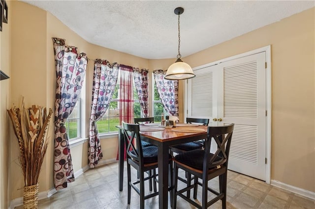 4450 Millenium View Ct, Snellville, GA 30039 - dining area with light flooring and a textured ceiling