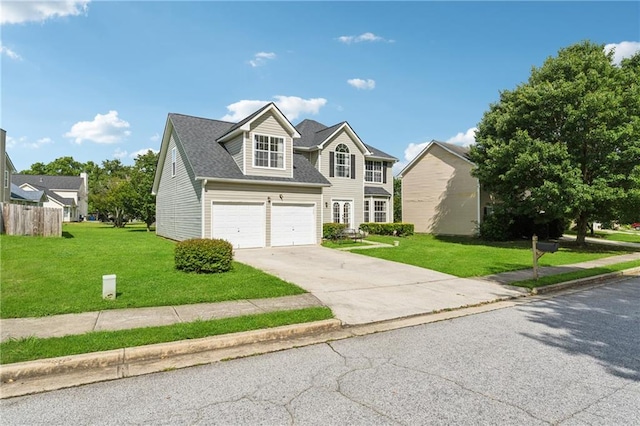 4450 Millenium View Ct, Snellville, GA 30039 - traditional-style house featuring concrete driveway, a garage, a front yard, and roof with shingles