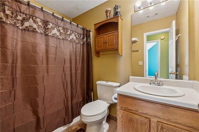 4450 Millenium View Ct, Snellville, GA 30039 - full bathroom featuring vanity, a textured ceiling, and a shower with curtain