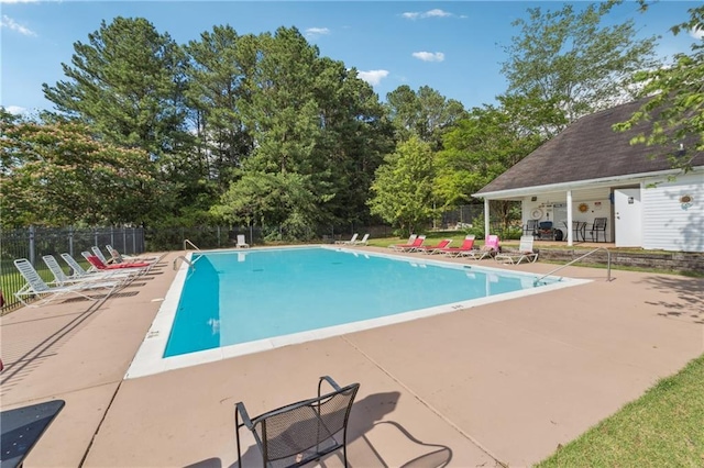 4450 Millenium View Ct, Snellville, GA 30039 - community pool with a patio and view of scattered trees