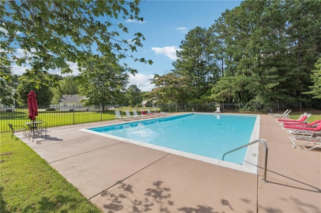 4450 Millenium View Ct, Snellville, GA 30039 - community pool with a patio area and view of scattered trees