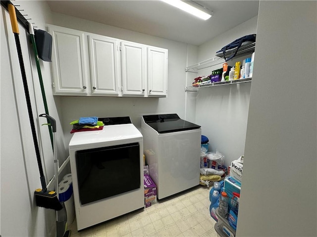 810 Doe Hill Ln, Roswell, GA 30075 - washroom featuring washing machine and clothes dryer, cabinet space, and light floors