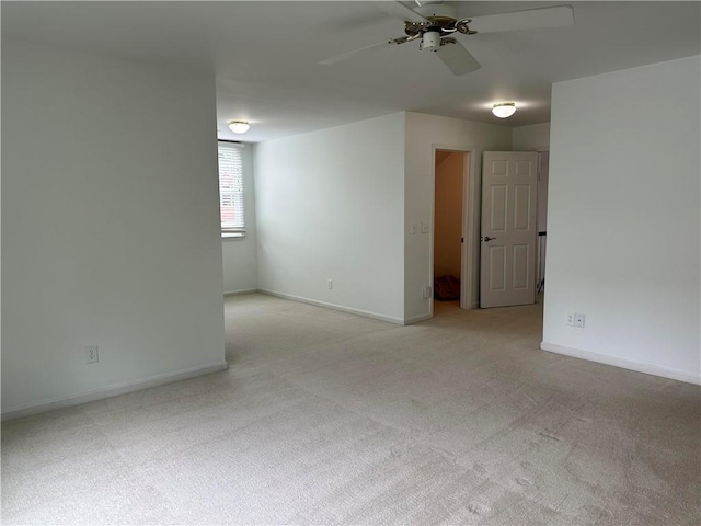 810 Doe Hill Ln, Roswell, GA 30075 - spare room with light colored carpet and a ceiling fan