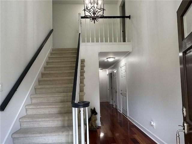 810 Doe Hill Ln, Roswell, GA 30075 - stairway with wood finished floors and a chandelier