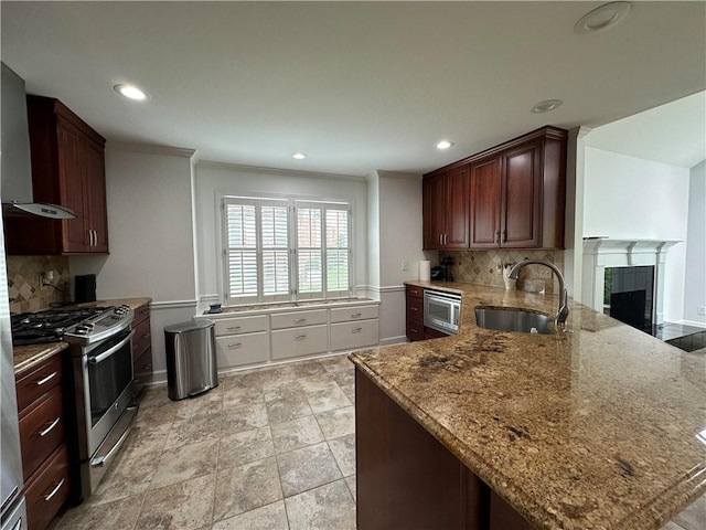 810 Doe Hill Ln, Roswell, GA 30075 - kitchen featuring appliances with stainless steel finishes, backsplash, a peninsula, wall chimney exhaust hood, and recessed lighting