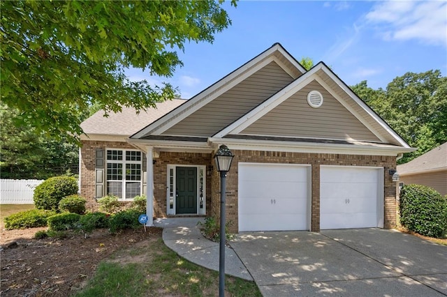 2401 Centennial Hill Way NW, Acworth, GA 30102 - view of front of property featuring brick siding, a garage, and driveway