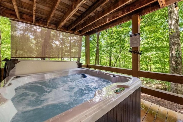 exterior space featuring a jacuzzi