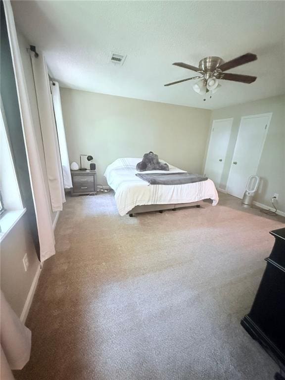 2661 Throatlatch Ln SW, Marietta, GA 30064 - bedroom featuring carpet flooring, a ceiling fan, and baseboards