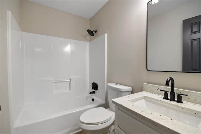 full bathroom with vanity, shower / bathtub combination, and toilet