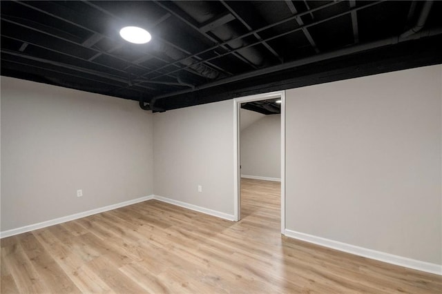 basement with light wood-type flooring