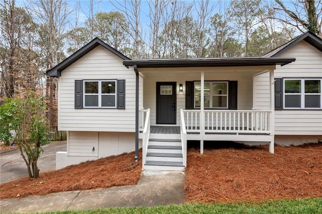 view of front of house featuring covered porch