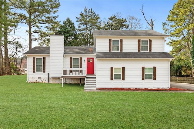 split level home featuring crawl space, a chimney, and a front yard