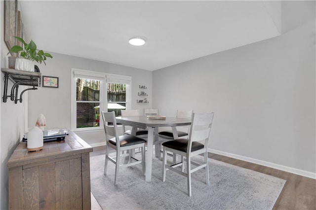 dining room featuring hardwood / wood-style flooring