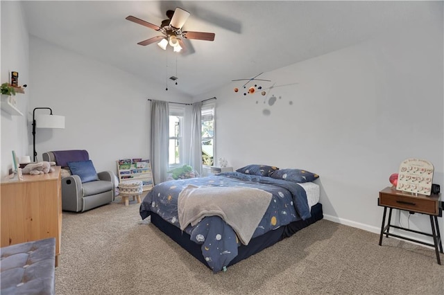 bedroom featuring ceiling fan, carpet, and lofted ceiling