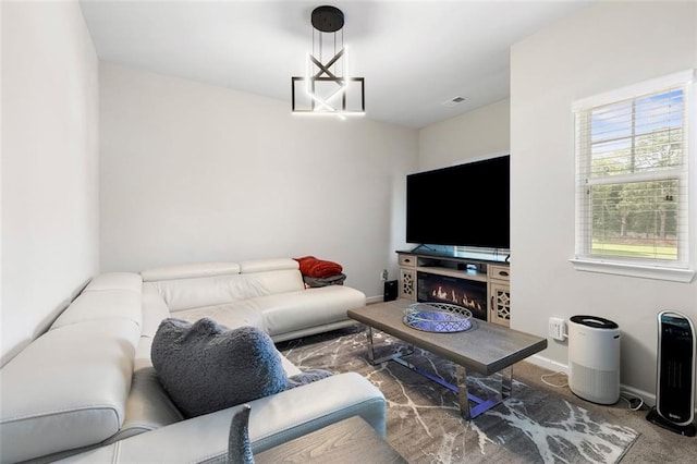 140 Canyons Ct, Hampton, GA 30228 - carpeted living room with baseboards