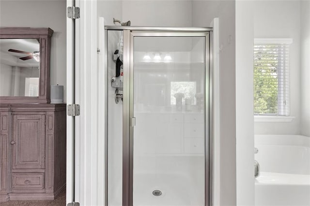 140 Canyons Ct, Hampton, GA 30228 - full bathroom with a stall shower, a bath, and ceiling fan