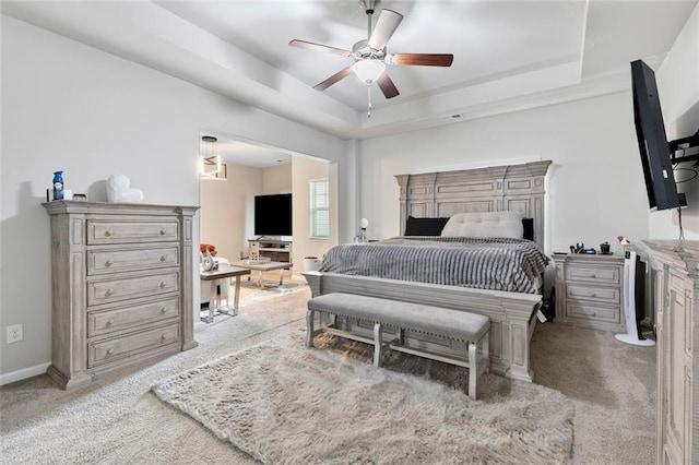 140 Canyons Ct, Hampton, GA 30228 - bedroom with light carpet, a raised ceiling, and ceiling fan