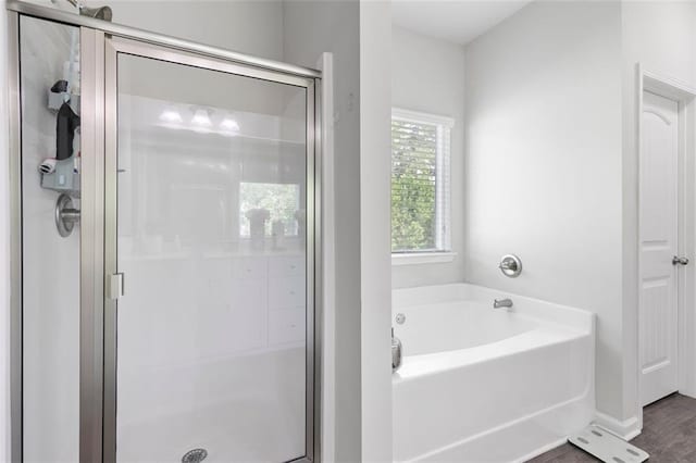 140 Canyons Ct, Hampton, GA 30228 - full bathroom featuring a stall shower and a bath