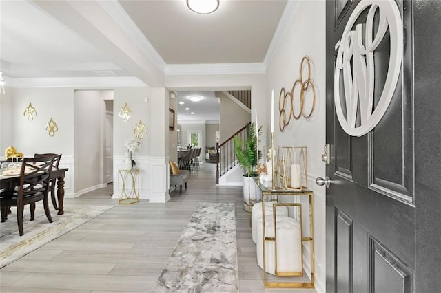 140 Canyons Ct, Hampton, GA 30228 - entrance foyer with ornamental molding, light wood-style flooring, and stairway