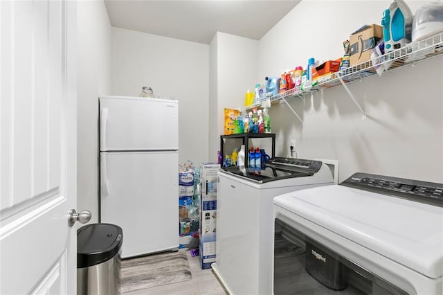 140 Canyons Ct, Hampton, GA 30228 - laundry area featuring washing machine and clothes dryer