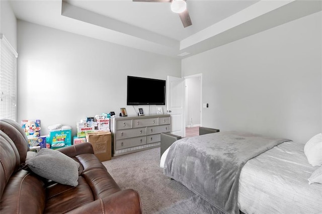 140 Canyons Ct, Hampton, GA 30228 - carpeted bedroom featuring a ceiling fan and a tray ceiling