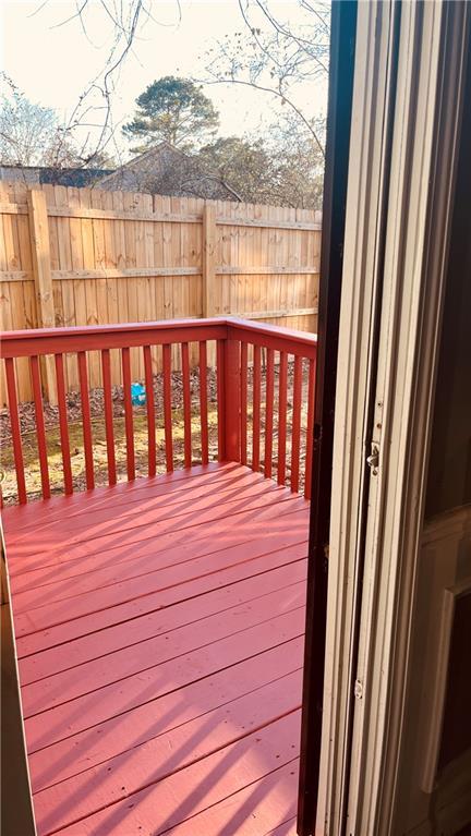 deck featuring fence