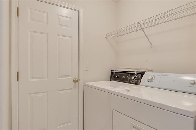 laundry area featuring laundry area and independent washer and dryer