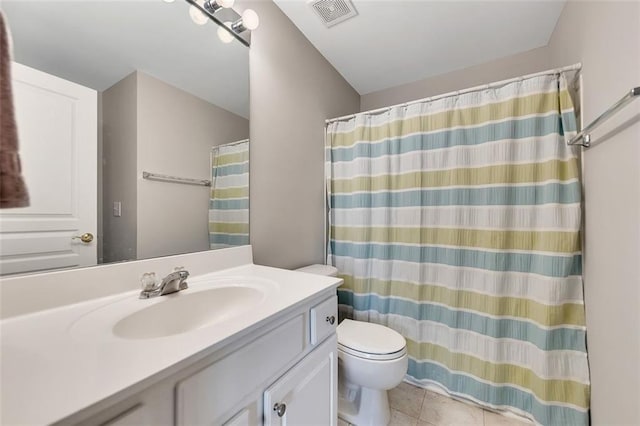 bathroom featuring a shower with curtain, visible vents, toilet, vanity, and tile patterned flooring