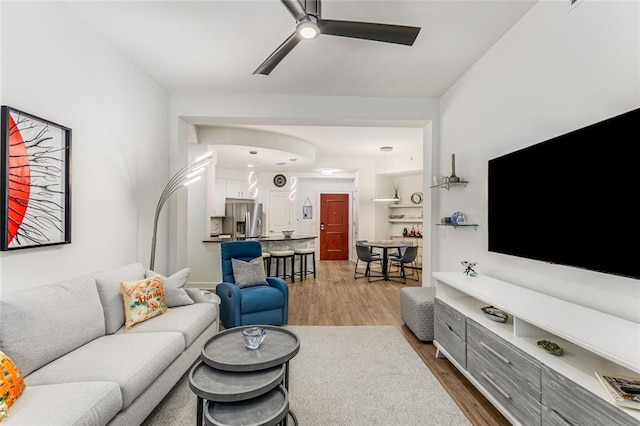 200 River Vista Dr Unit 713, Atlanta, GA 30339 - living room with a ceiling fan and wood finished floors