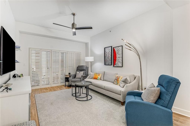 200 River Vista Dr Unit 713, Atlanta, GA 30339 - living room with ceiling fan and wood finished floors