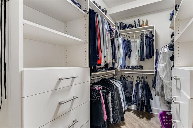 200 River Vista Dr Unit 713, Atlanta, GA 30339 - walk in closet with wood finished floors