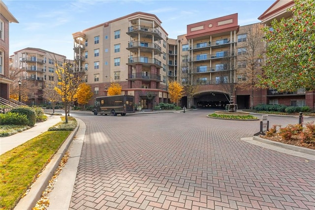 200 River Vista Dr Unit 713, Atlanta, GA 30339 - view of building exterior featuring a parking lot