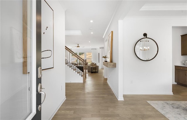 4317 Azalea Ridge Way, Hoschton, GA 30548 - entrance foyer with light wood-type flooring, stairs, recessed lighting, a chandelier, and a ceiling fan