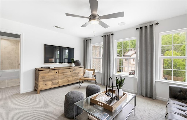 4317 Azalea Ridge Way, Hoschton, GA 30548 - carpeted living area featuring a ceiling fan and baseboards