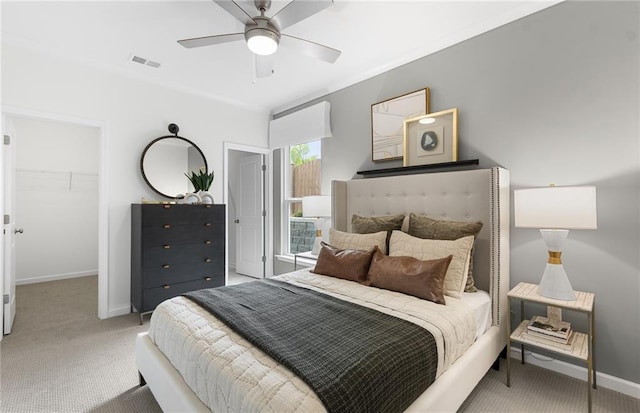 4317 Azalea Ridge Way, Hoschton, GA 30548 - carpeted bedroom featuring a ceiling fan and a walk in closet