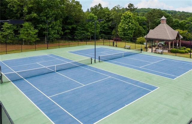 4317 Azalea Ridge Way, Hoschton, GA 30548 - view of tennis court with a gazebo, a forest view, and community basketball court