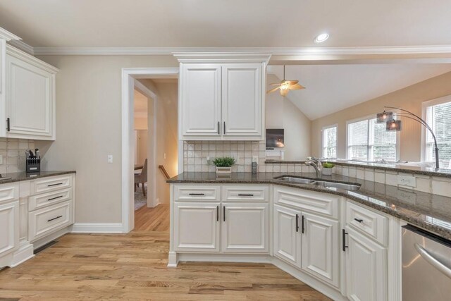 4621 Chartwell Chase Ct, Flowery Branch, GA 30542 - kitchen with a sink, ceiling fan, white cabinets, stainless steel dishwasher, and backsplash