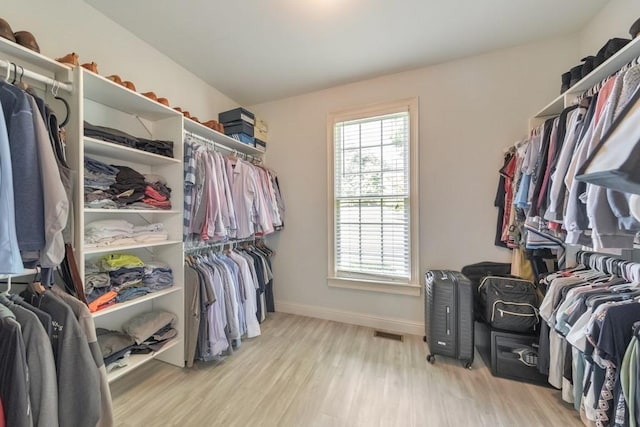 4621 Chartwell Chase Ct, Flowery Branch, GA 30542 - spacious closet with wood finished floors