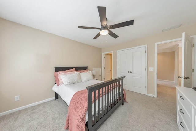 4621 Chartwell Chase Ct, Flowery Branch, GA 30542 - bedroom with light carpet, baseboards, ceiling fan, and a closet