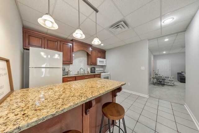 4621 Chartwell Chase Ct, Flowery Branch, GA 30542 - kitchen featuring white appliances, a sink, light tile patterned floors, baseboards, and recessed lighting