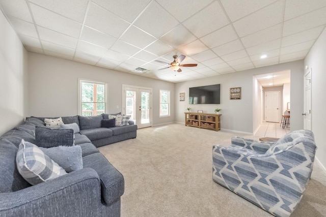 4621 Chartwell Chase Ct, Flowery Branch, GA 30542 - living room with carpet flooring, a paneled ceiling, ceiling fan, french doors, and baseboards