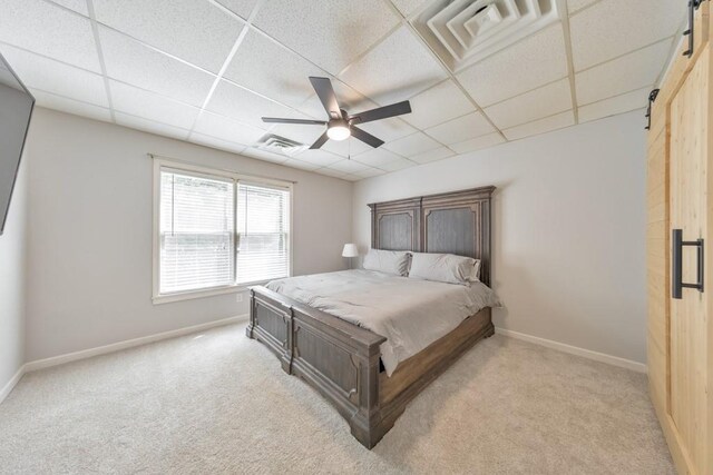 4621 Chartwell Chase Ct, Flowery Branch, GA 30542 - bedroom featuring a barn door, a paneled ceiling, light carpet, baseboards, and ceiling fan