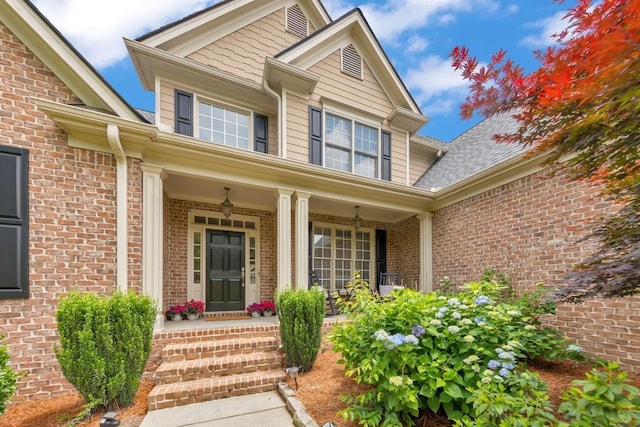 4621 Chartwell Chase Ct, Flowery Branch, GA 30542 - property entrance featuring a porch and brick siding