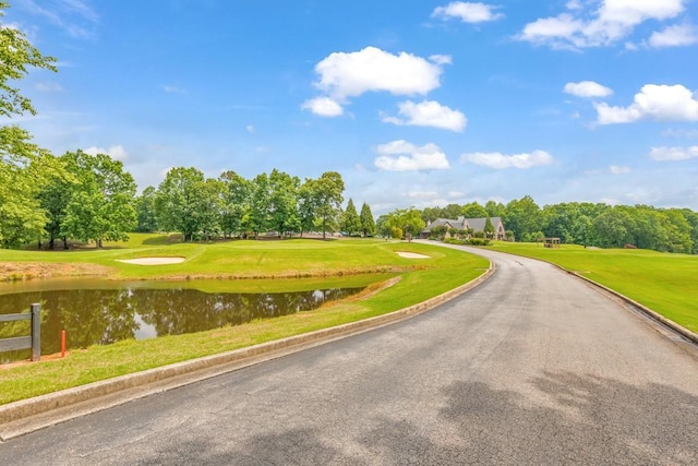 4621 Chartwell Chase Ct, Flowery Branch, GA 30542 - view of street featuring a water view, view of scattered trees, golf course view, and curbs