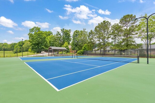 4621 Chartwell Chase Ct, Flowery Branch, GA 30542 - view of tennis court with fence and community basketball court