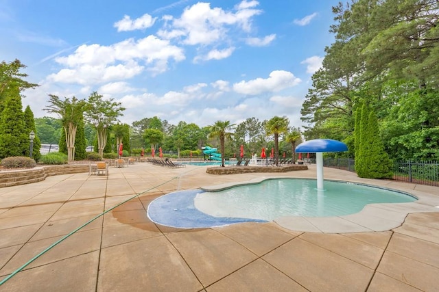 4621 Chartwell Chase Ct, Flowery Branch, GA 30542 - community pool featuring a patio, fence, and view of wooded area