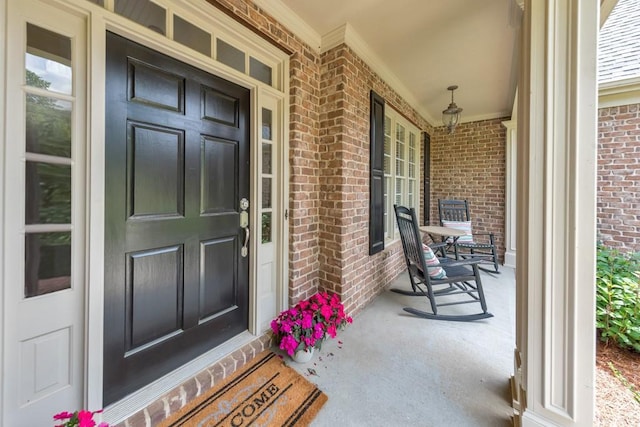 4621 Chartwell Chase Ct, Flowery Branch, GA 30542 - doorway to property with a porch and brick siding